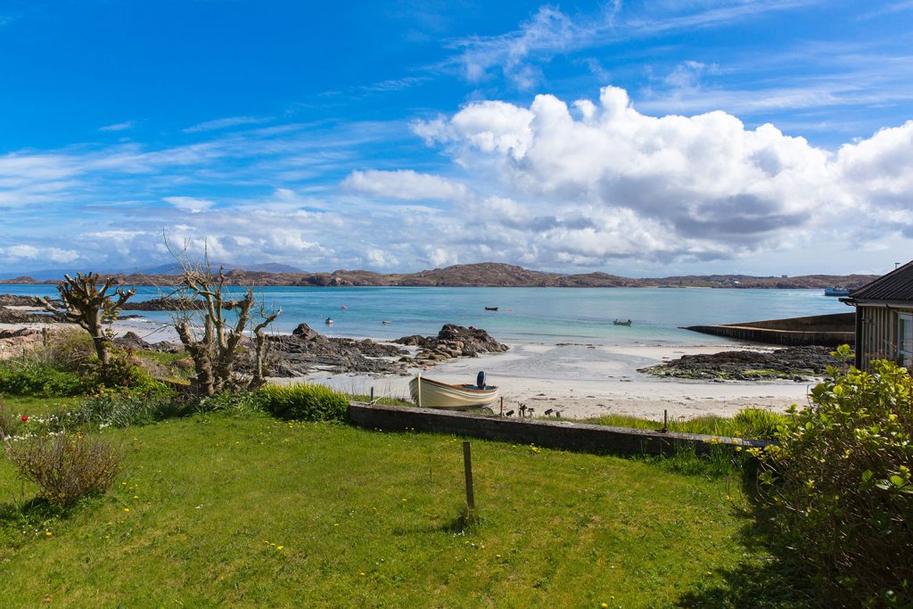 white bay with clear turquoise sea, Iona Scotland