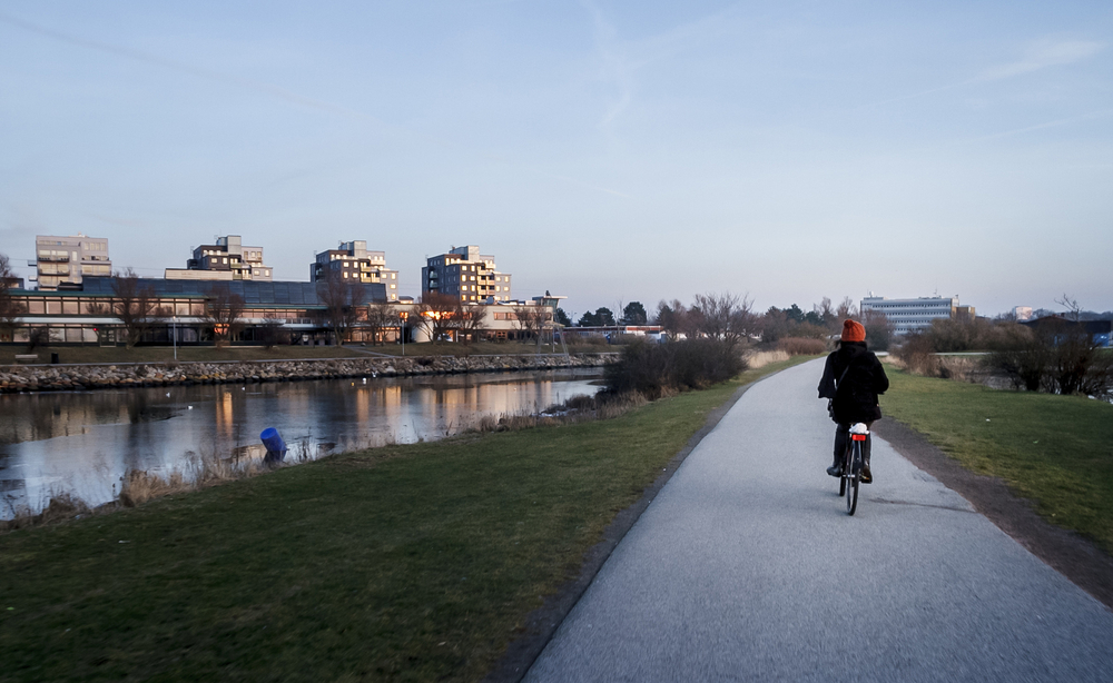 lady cyclist on a path in Malmo Sweden