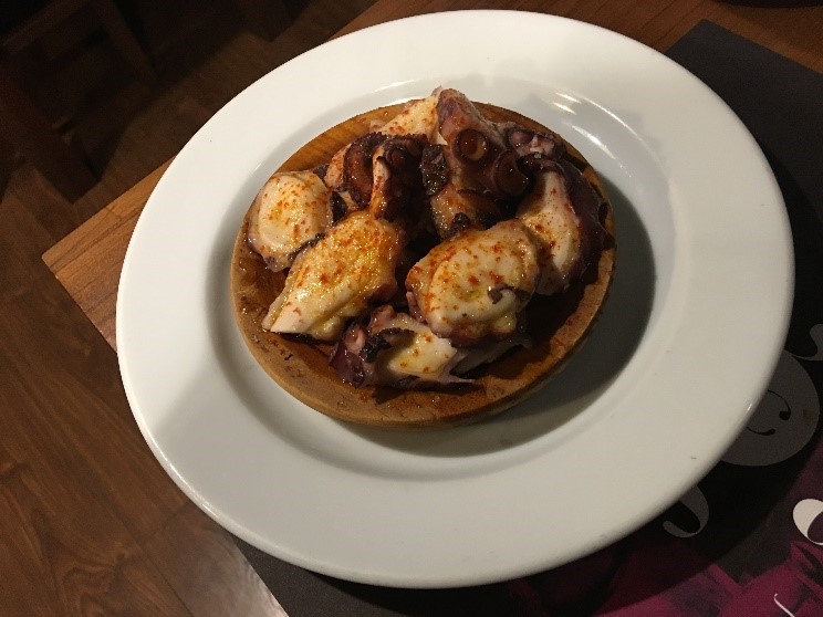 Polbo á feira is always served on a wooden plate.
