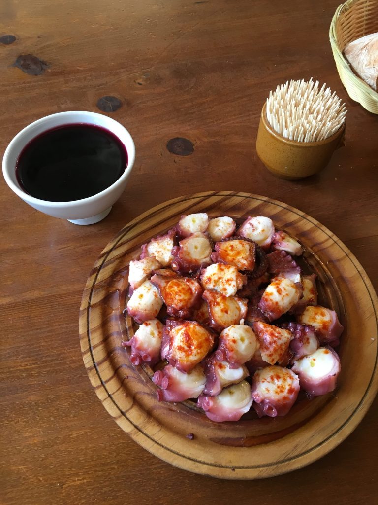 Photo of octopus and wine.