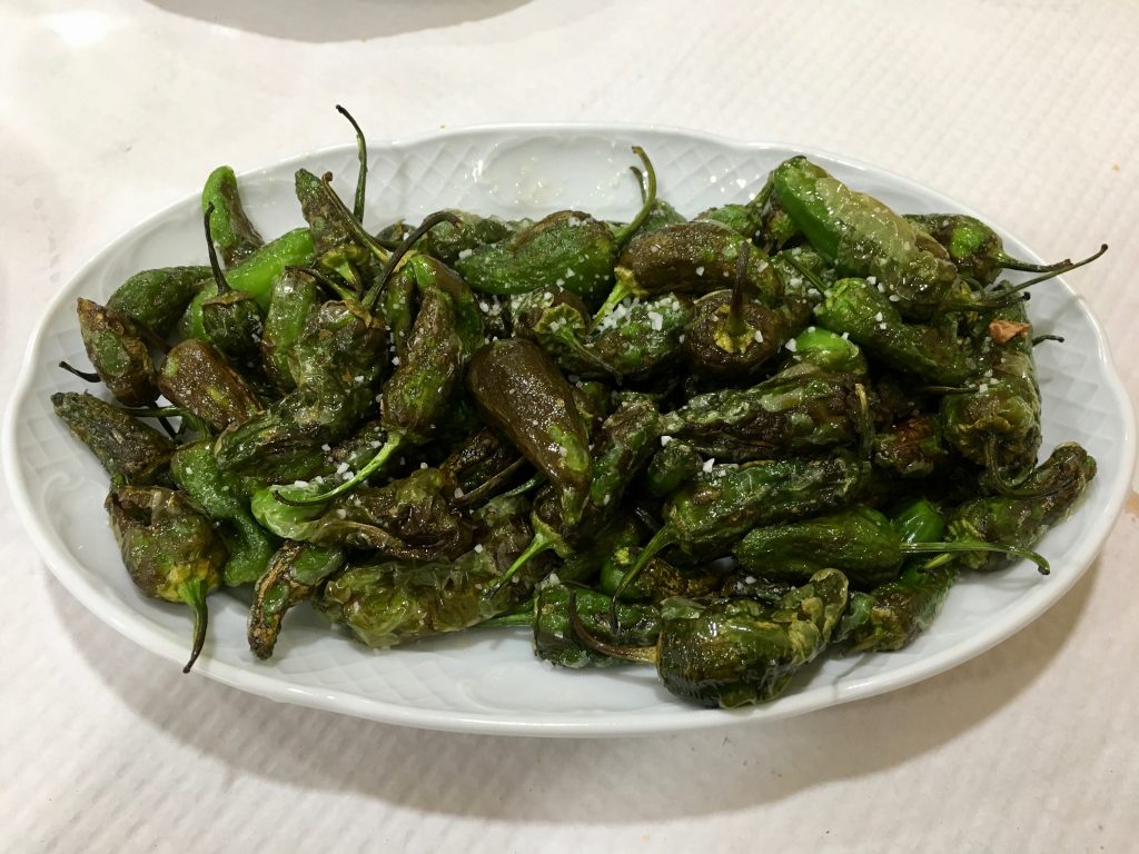 Padron peppers on a plate.
