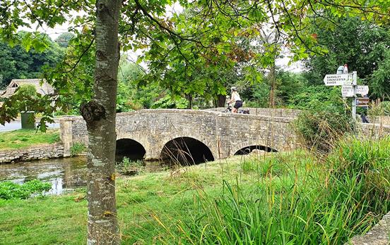 Cycling into Bibury, the Cotswolds