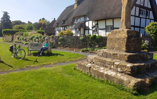 A classic thatched cottage with wooden beams