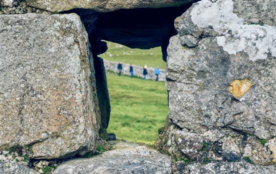 Walkers in the dales through a hole in the wall