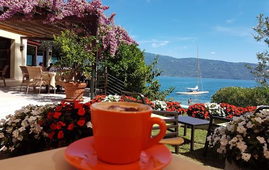 Enjoy a coffee on the shores of Lake Garda
