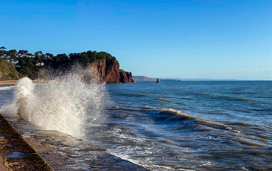 Feel the power of the sea hitting the coast