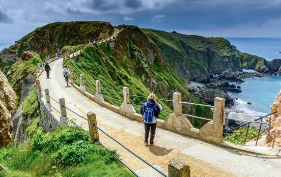Walk across La Coupee on the Isle of Sark