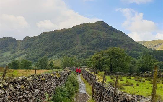 Classic English dry stone walls bordering paths