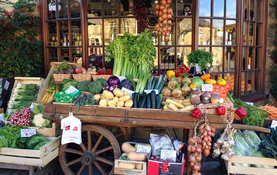 Fresh fruit stalls in quaint English market towns