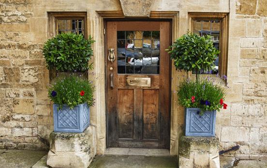 Teak tough wooden door with plenty of character