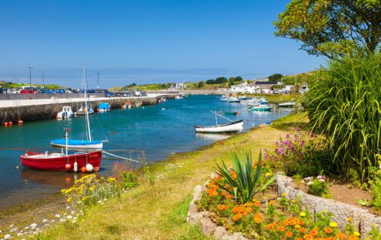 Palm trees, secluded coves and flowers