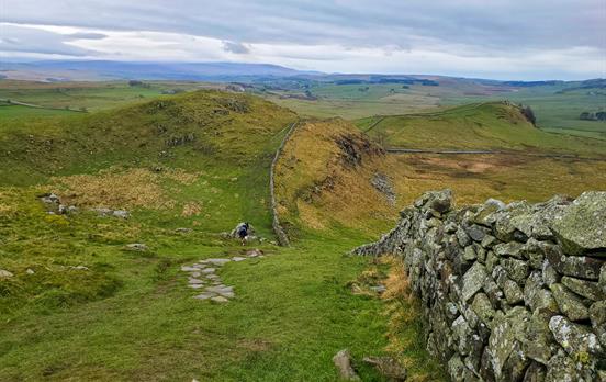 Wall cutting through the English countryside