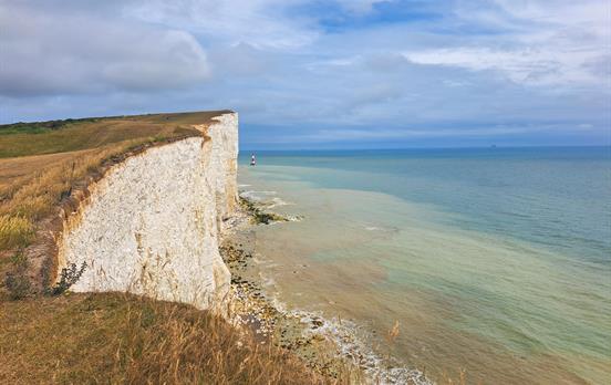 Beachy Head with its lighthouse in the distance