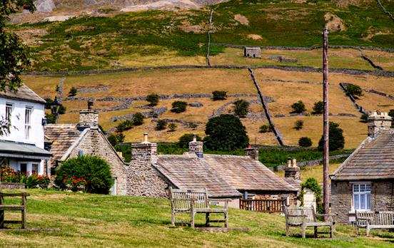 Watch the world go buy from Reeth's village green