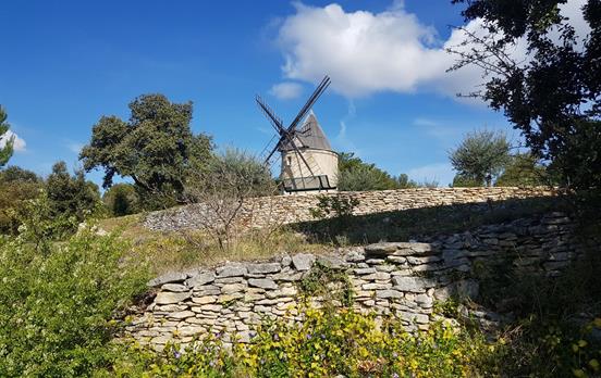 Pass historic windmills