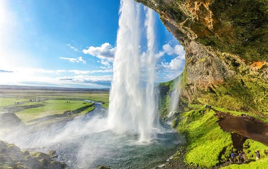 Walk behind Seljalandsfoss Waterfall