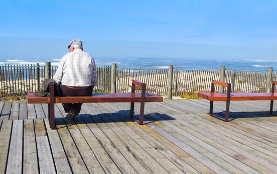 Friendly local having lunch by the sea