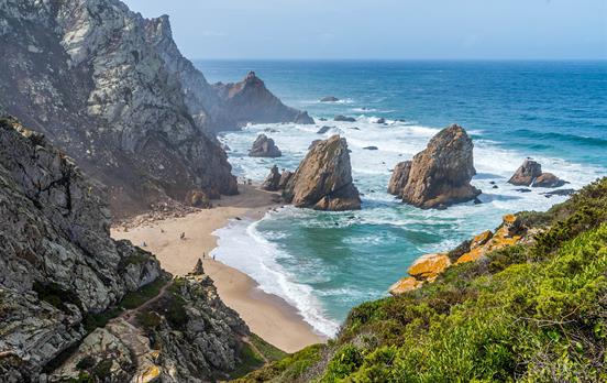 Cliff side walking on rugged Portuguese coastline