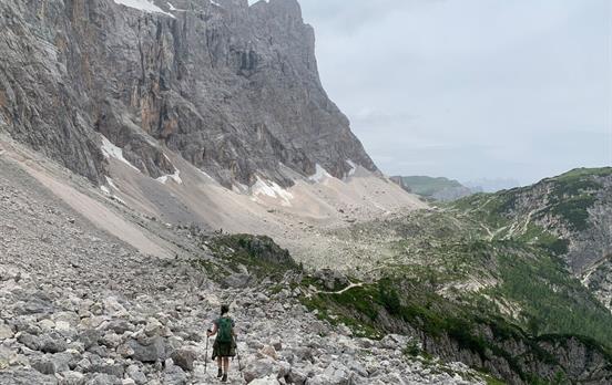 Hiker on the way down from Lago Coldai