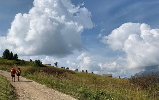Hikers on the Pralongia Plateau