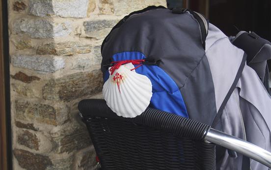 Adhorn the famous Camino shell on your pack