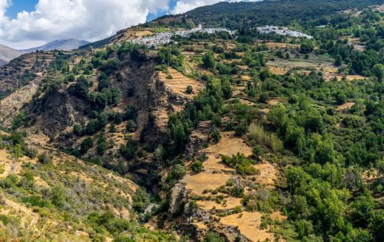Pretty villages bask in the dramatic landscape