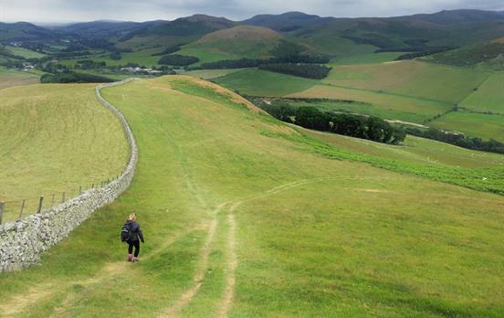 Descending a wide open hill