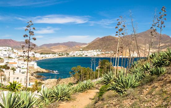 Whitewashed villages backed by desert landscapes