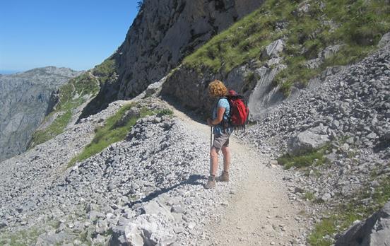 A walker approaching the massif