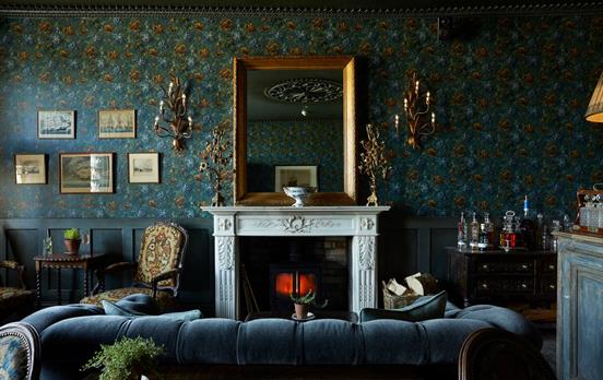 Relax fireside in Harlyn Bay.