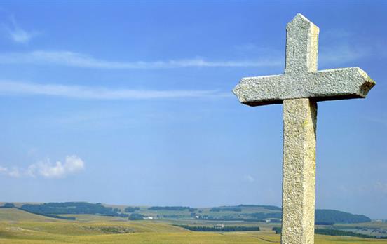 Ancient stone cross en route