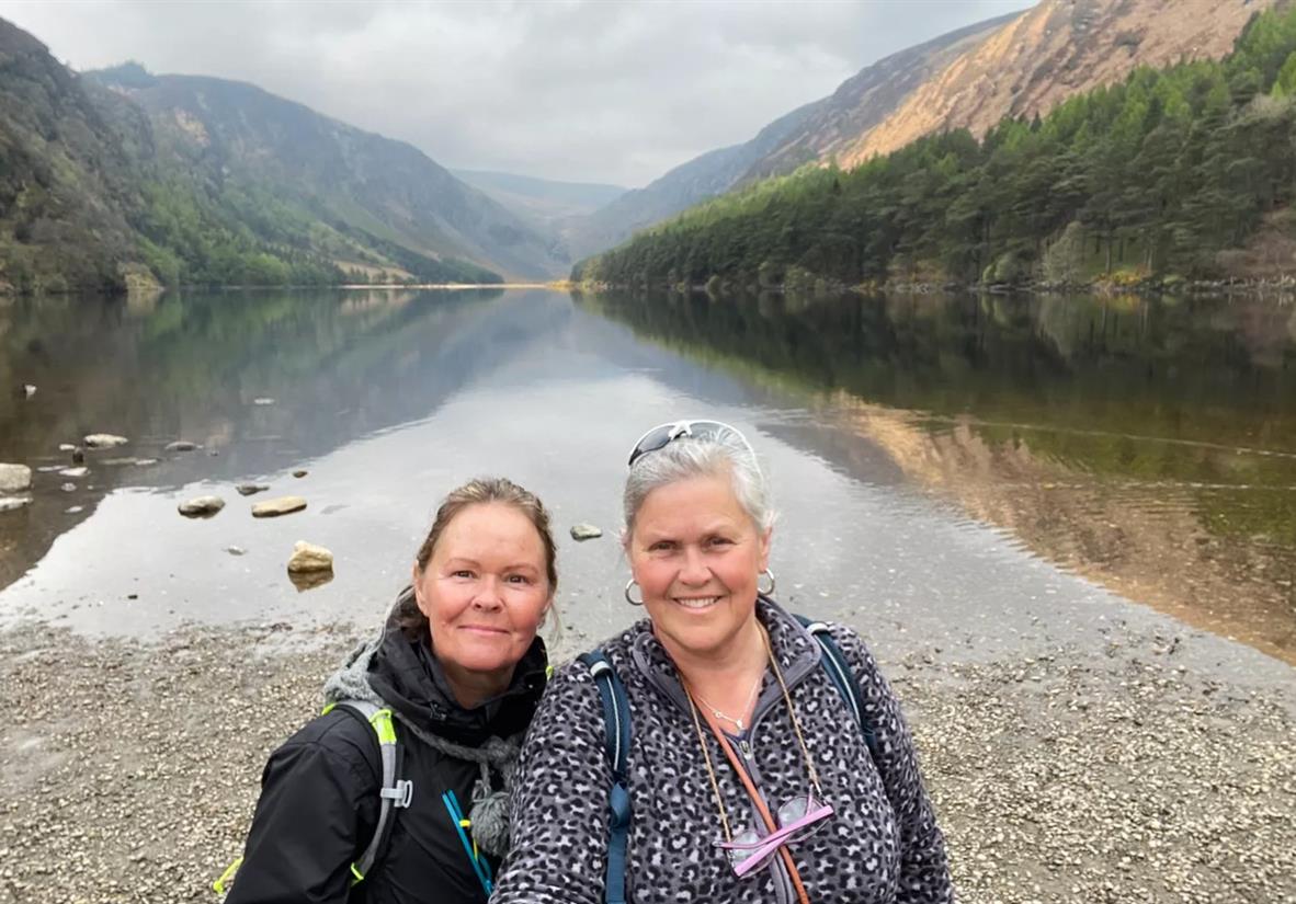 Happy hikers lakeside in the 'Garden of Ireland'