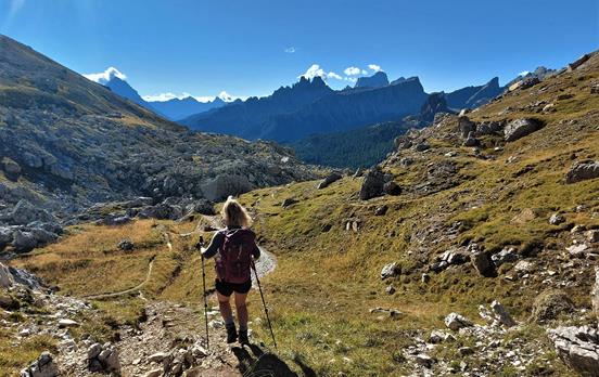 Hiker walking to Cortina