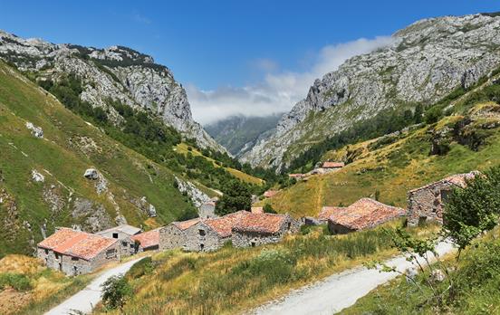 Walk through idyllic pastures filled with chalets