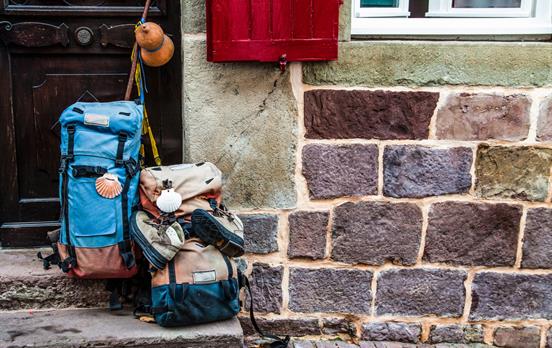 Adhorn the iconic camino shell on your daypack