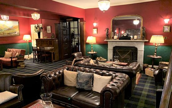 Cozy up by the fire in the Atholl Arms bar
