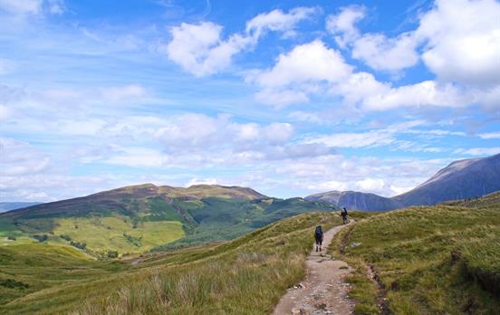 Hikers on the trail with views of Ben Nevis