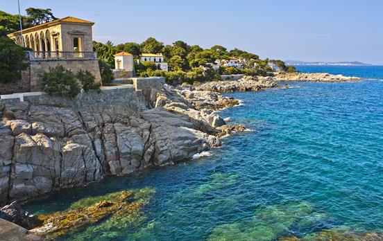 Walk on coastal paths alongside the glittering Med