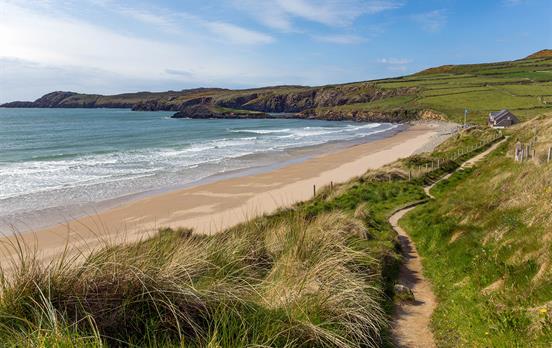 Beautiful deserted golden beaches in Wales