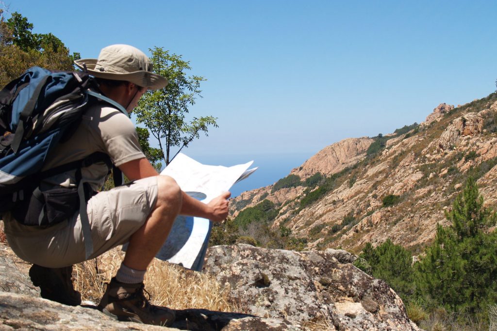 Checking the map on the Corsica: Mountains to the Sea