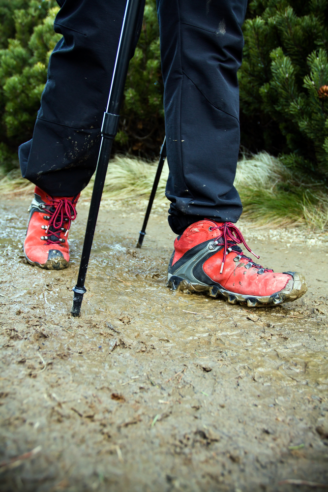 muddy boots on a muddy hiking trail