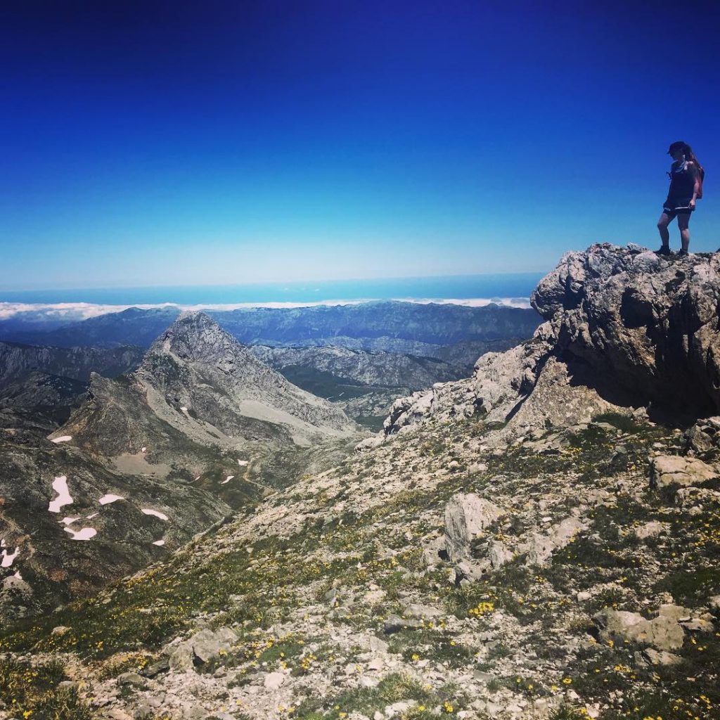 walker at the summit in the Picos de Europa