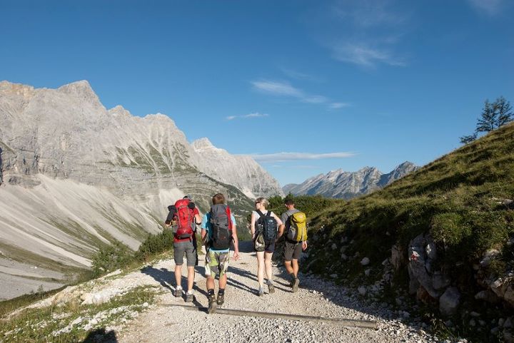 Group walking in tyrolean alps