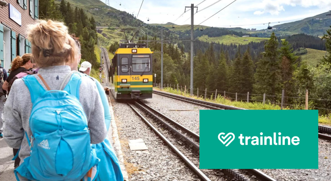 hiker standing on platform as train approaches